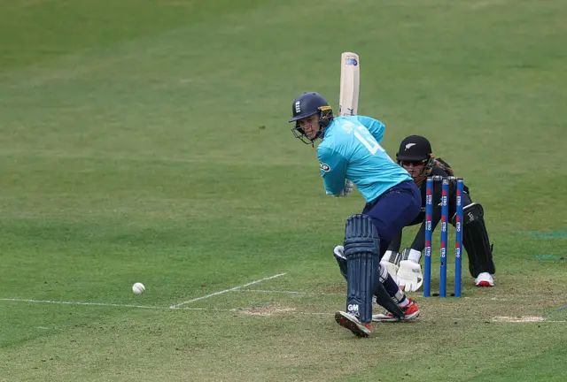 Amy Jones plays a shot