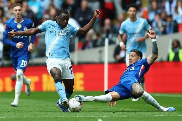 Enzo Fernandez tackles Doku