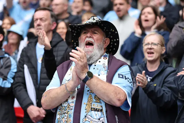 Fans of Manchester City show their support
