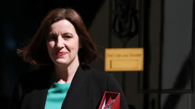 Bridget Phillipson steps out of Downing Street carrying a red folder