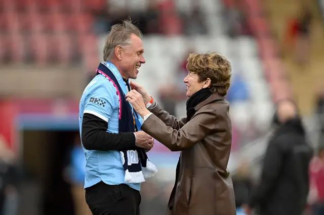 Man City boss collecting medal