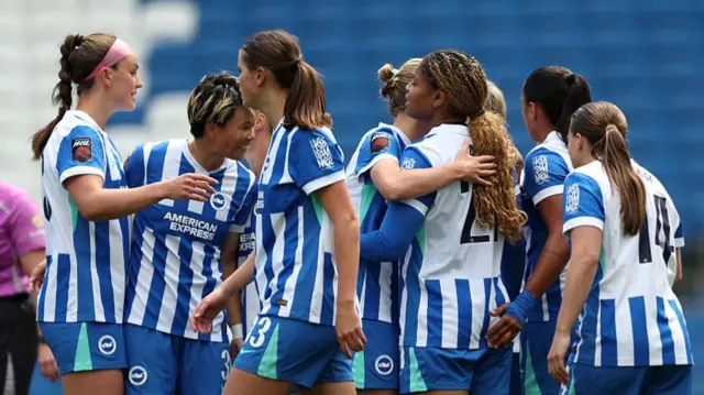 Brighton players celebrate