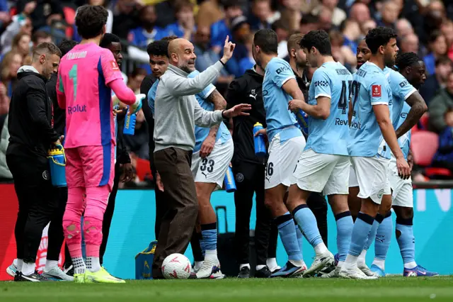 Manchester City take instructions from manager Pep Guardiola