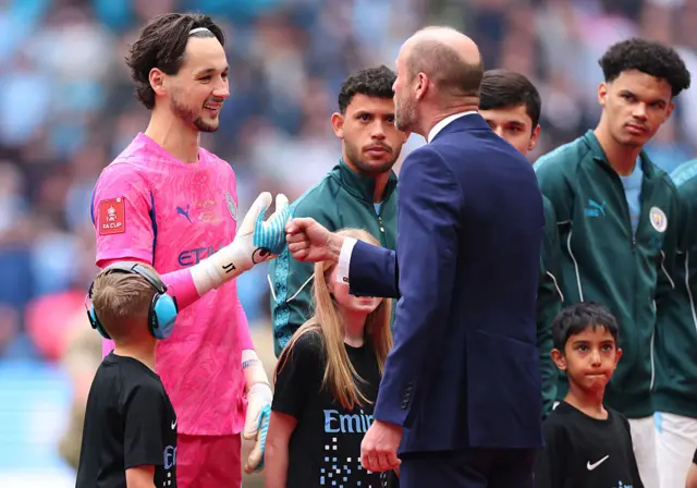 Manchester City's James Trafford and Prince William