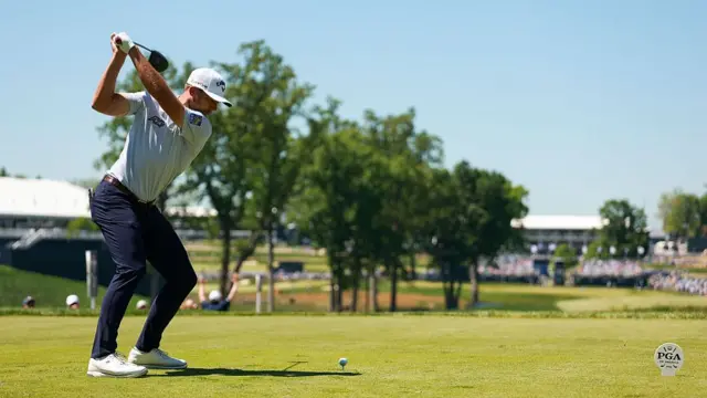 Sam Burns drives from the tee