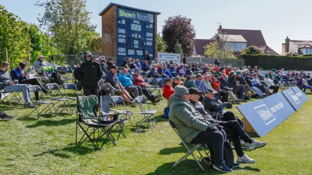 Spectaors watching Lancashire v Worcestershire on the opening day in Southport
