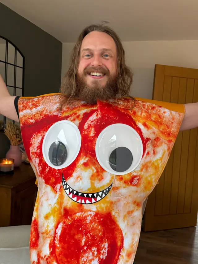 Eurovision fan dressed as a pizza