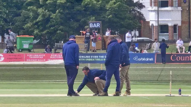 Pitch inspection after rain got under the covers