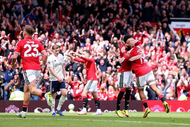 Mbeumo celebrates a goal