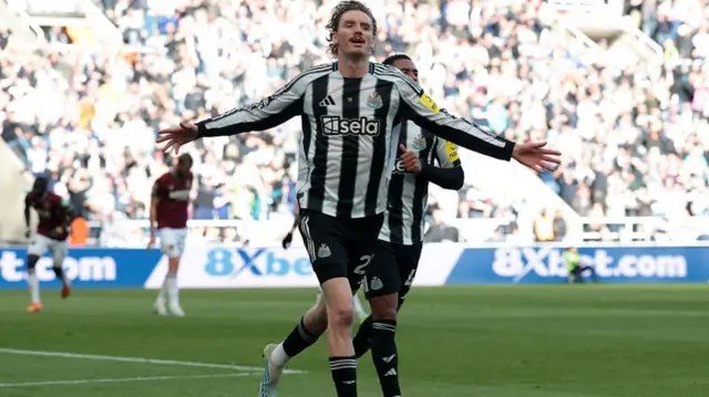 Nick Woltemade of Newcastle United celebrates scoring his team's first goal during the Premier League match between Newcastle United and West Ham United at St James' Park