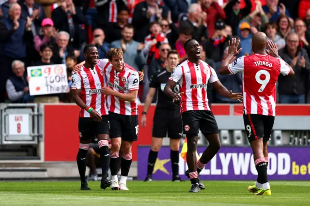 Dango Ouattara of Brentford celebrates scoring his team's first goal with teammates during the Premier League match between Brentford and Crystal Palace at Gtech Community Stadium