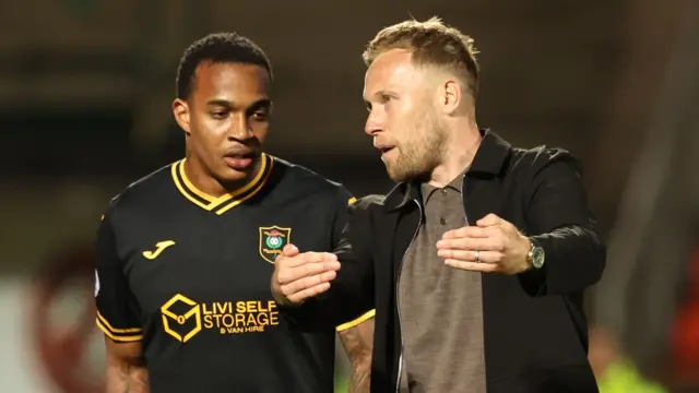 Livingston's interim player-head coach Scott Arfield (right) with Joshua Zimmerman