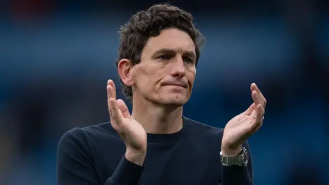 Brentford boss Keith Andrews applauds supporters