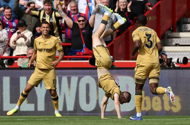 Adam Wharton (C) celebrates scoring the team's second goal during the English Premier League football match between Brentford and Crystal Palace at the Gtech Community Stadium