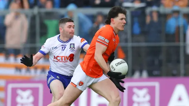 Armagh's Joe McElroy with David Garland of Monaghan