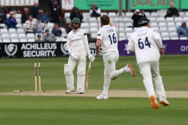 Sam Cook bowls Jonny Tattersall