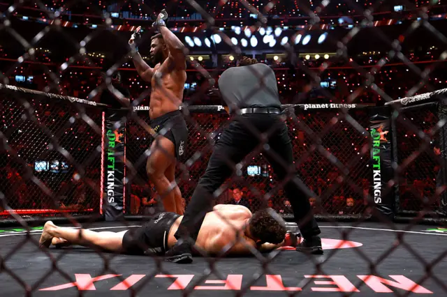Francis Ngannou stands over a knocked out Philipe Lins