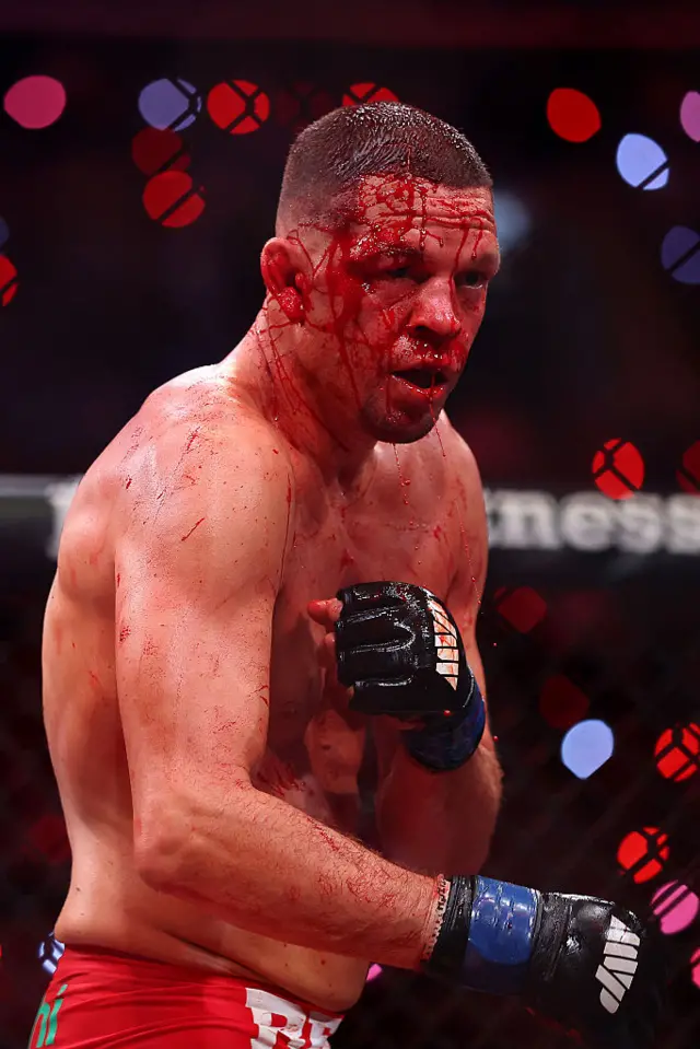 Blood pours from Nate Diaz's face