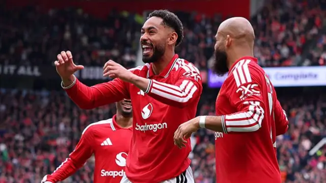 Cunha celebrates after gaining a goal