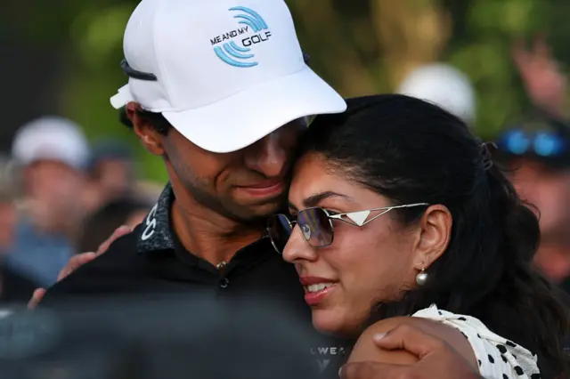 Aaron Rai and his wife