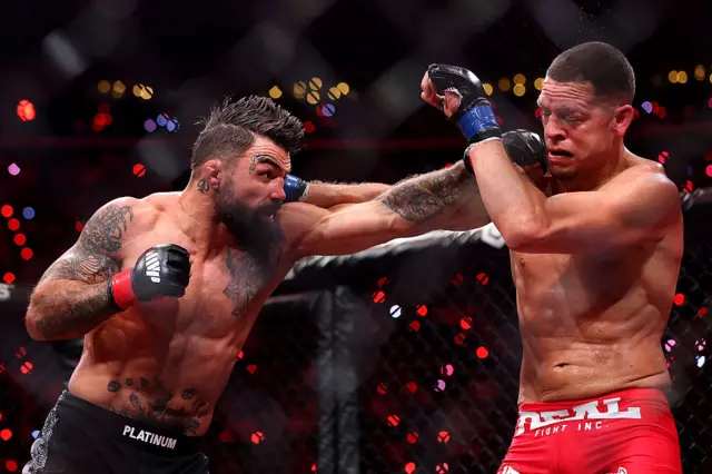 Mike Perry punches Nate Diaz