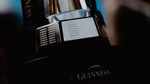 The base of the silver Women's Six Nations trophy, showing the past eight winners engraved on a silver strip