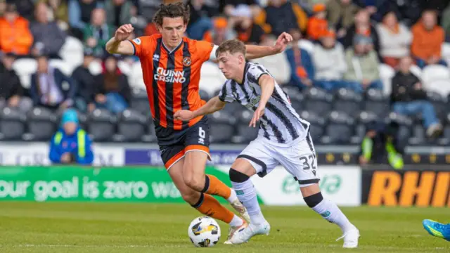Dundee United's Ross Graham and St Mirren's Luke Douglas