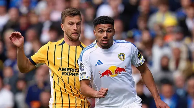 ames Justin of Leeds United and Joel Veltman of Brighton & Hove Albion in action during the Premier League match between Leeds United and Brighton & Hove Albion