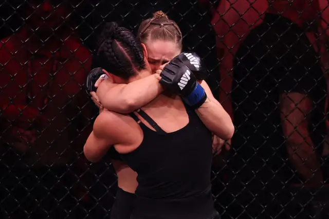 Ronda Rousey hugs Gina Carano