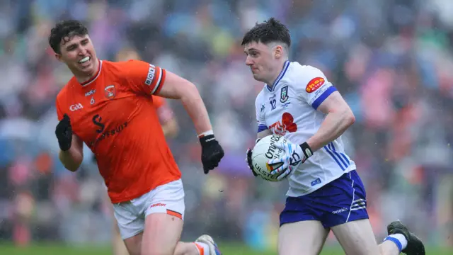 Monaghan's Stephen O'Hanlon with Tiernan Kelly of Armagh