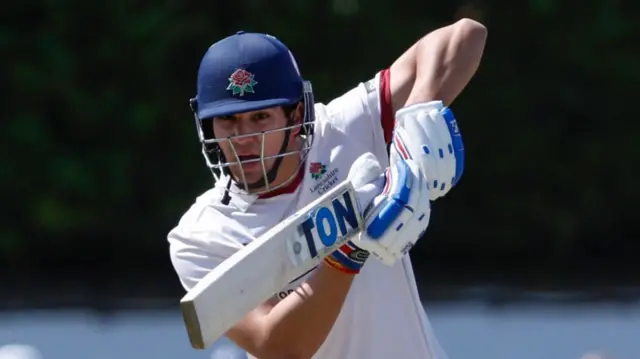 Harry Singh playing a shot into the off side for Lancashire.