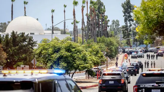 Police cars lined up in front of the Islamic Center in San Diego
