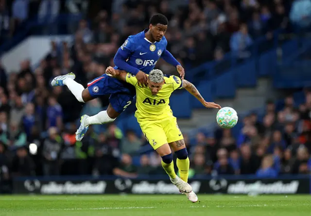 Richarlison of Tottenham Hotspur is challenged by Jorrel Hato