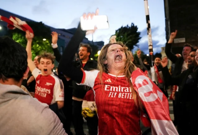 Arsenal fans celebrate at The Drayton Park Arms