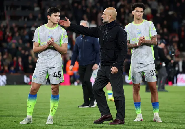 Pep Guardiola, Manager of Manchester City, consoles Abdukodir Khusanov