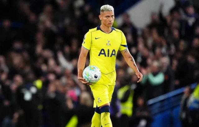 Tottenham Hotspur's Richarlison stands dejected after Chelsea's Andrey Santos scores