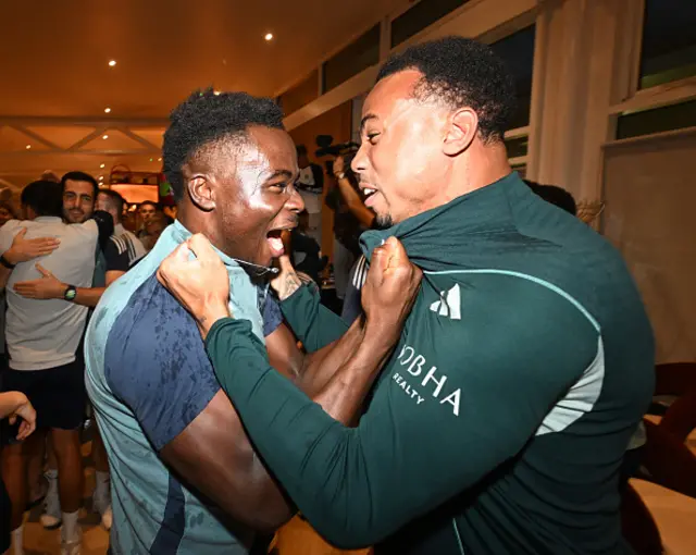 Saka and Saliba celebrate