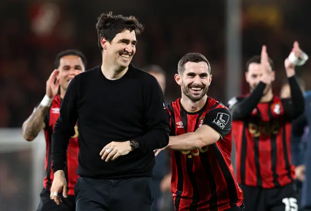 Andoni Iraola, Manager of AFC Bournemouth, is pushed towards the fans in celebration