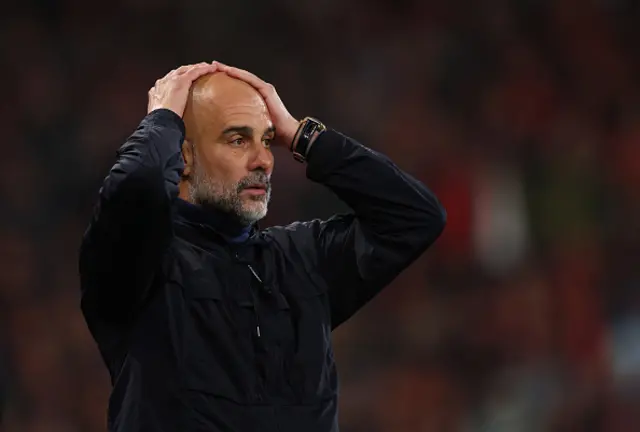 Pep Guardiola Manager / Head Coach of Manchester City reacts