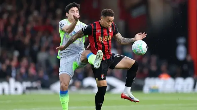 Marcus Tavernier of AFC Bournemouth is challenged by Abdukodir Khusanov