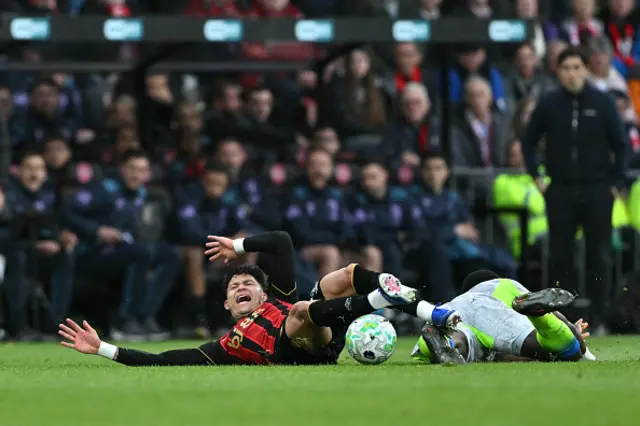 Evanilson reacts after colliding with Manchester City's English defender #15 Marc Guehi