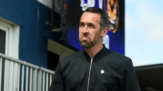 Christian Fuchs arrives at Holker Street