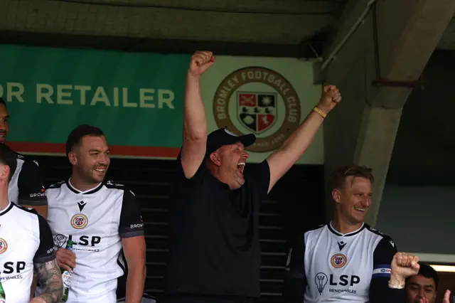 Bromley boss Andy Woodman celebrates winning the League Two title