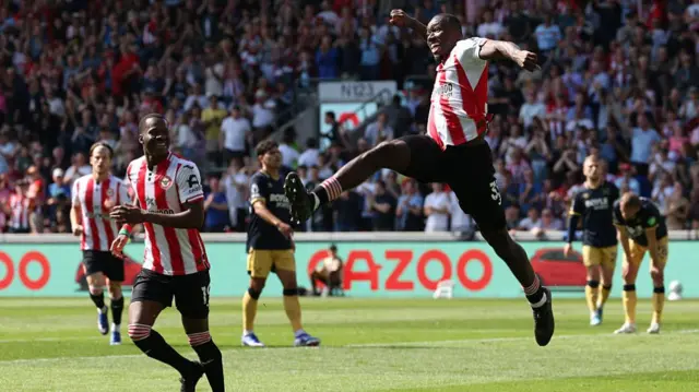 Michael Kayodecelebrates scoring the team's first goal