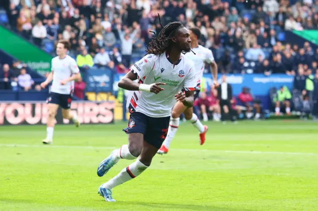 Ibrahim Cissoko celebrates giving Bolton the lead against Luton
