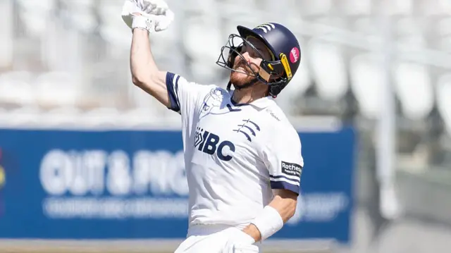 Ryan Higgins celebrates scoring century