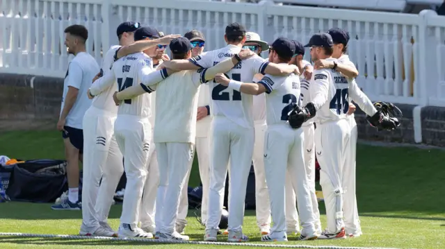 Middlesex players in a huddle