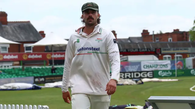 Ben Green leaves the field