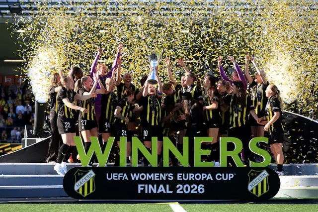 Hacken players lift the Europa cup trophy