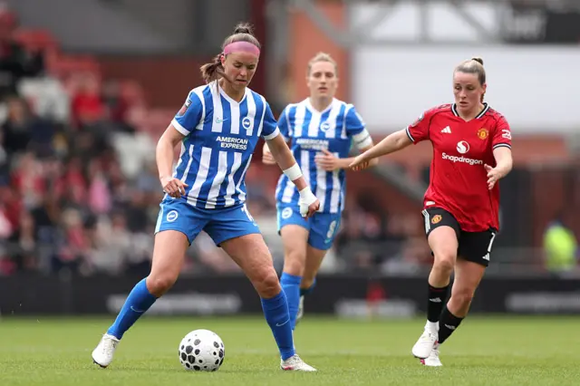 Caitlyn Hayes of Brighton & Hove Albion controls the ball while under pressure from Ella Toone of Manchester United during the Barclays Women's Super League match between Manchester United and Brighton & Hove Albion at Progress with Unity Stadium on May 02, 2026.